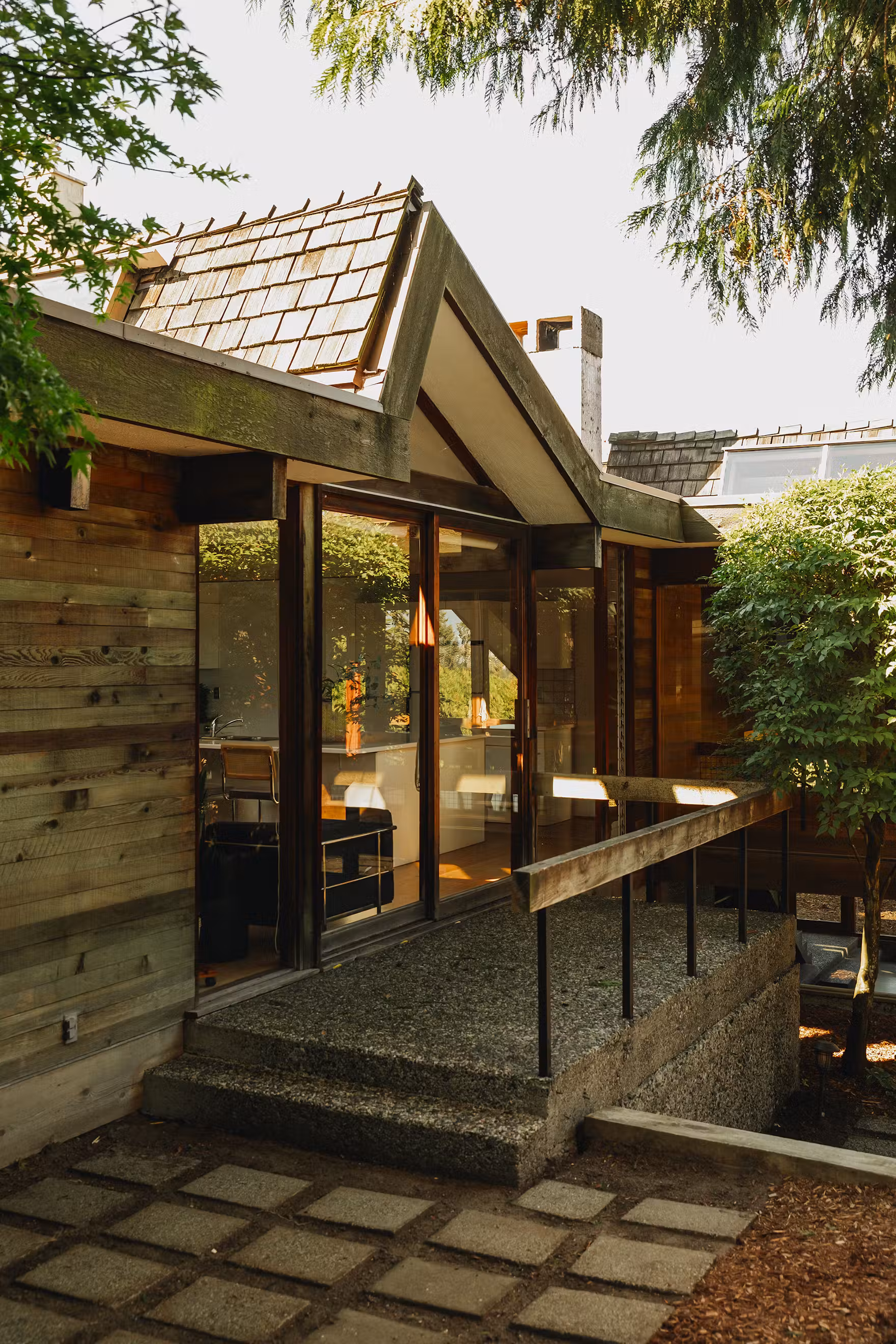 Sound House courtyard with cedar and glass