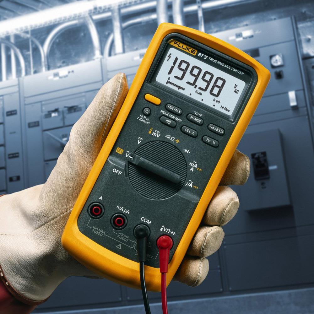 Fluke 87V multimeter testing EV charger wiring