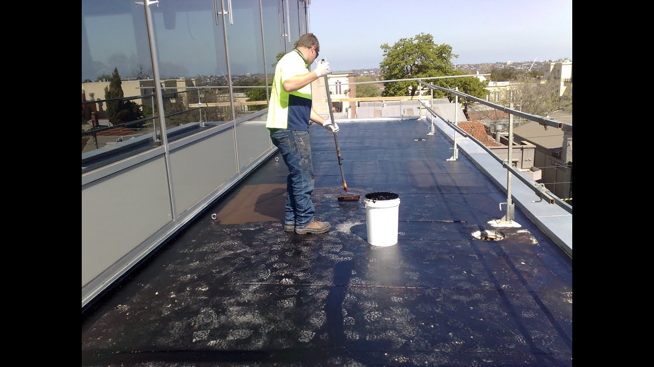 Cracked liquid rubber roof at parapet