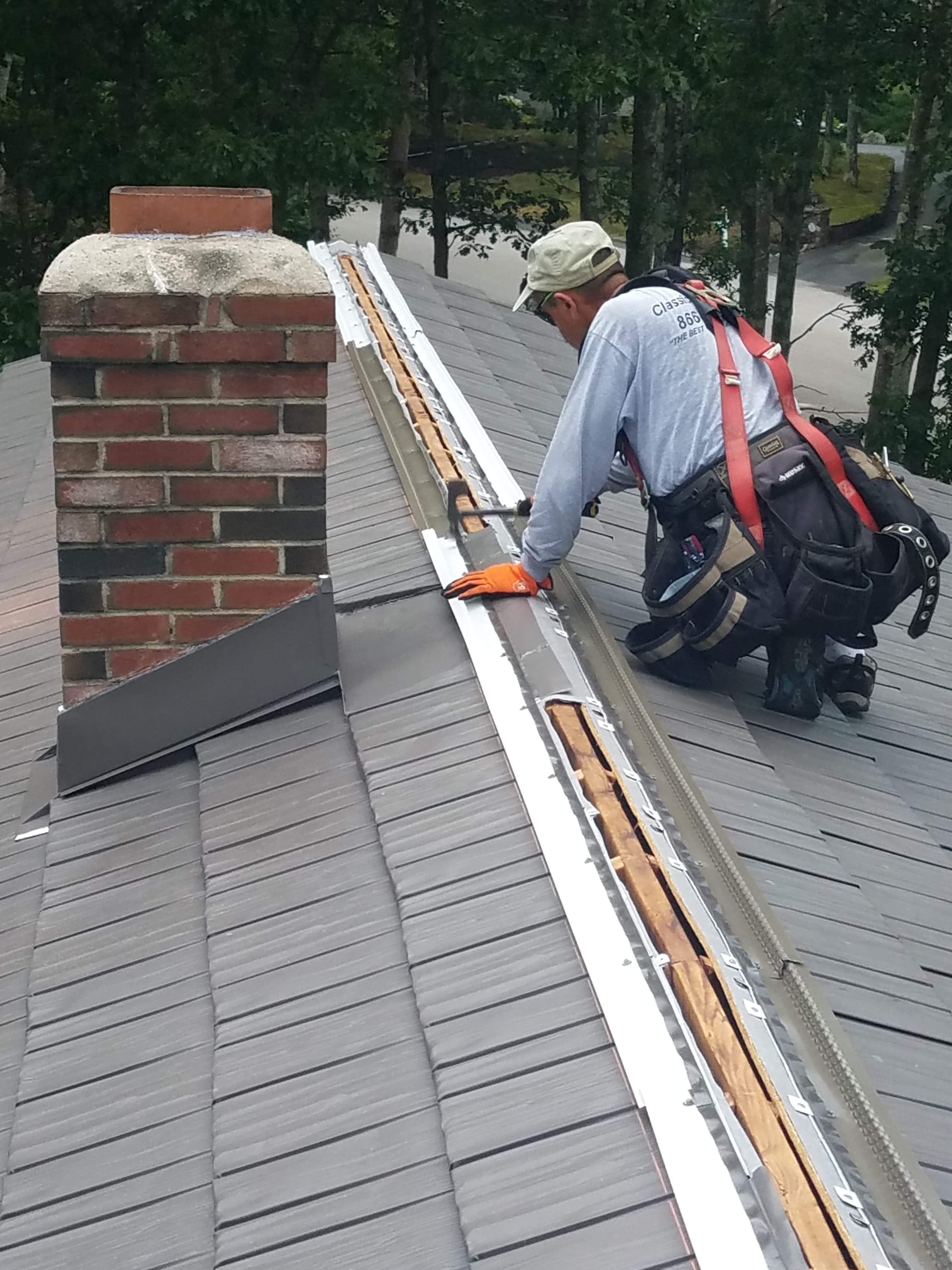 Air sealing at metal deck parapet