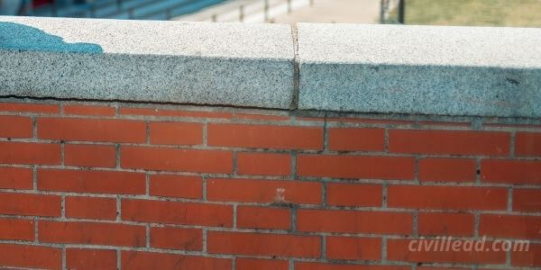 Water-stained stucco parapet
