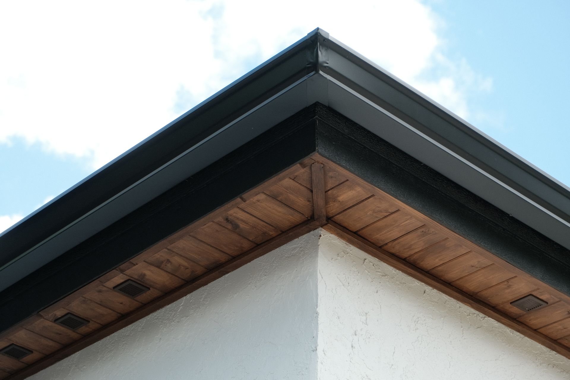 Tongue-and-groove soffit with vented roof
