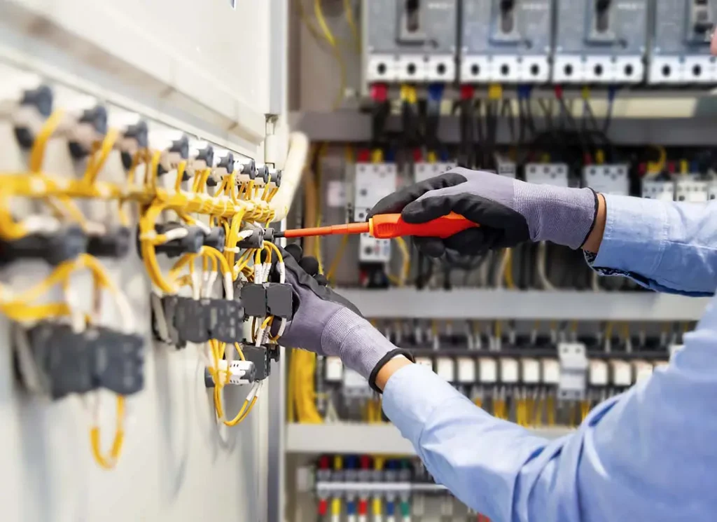Commercial electrician at work